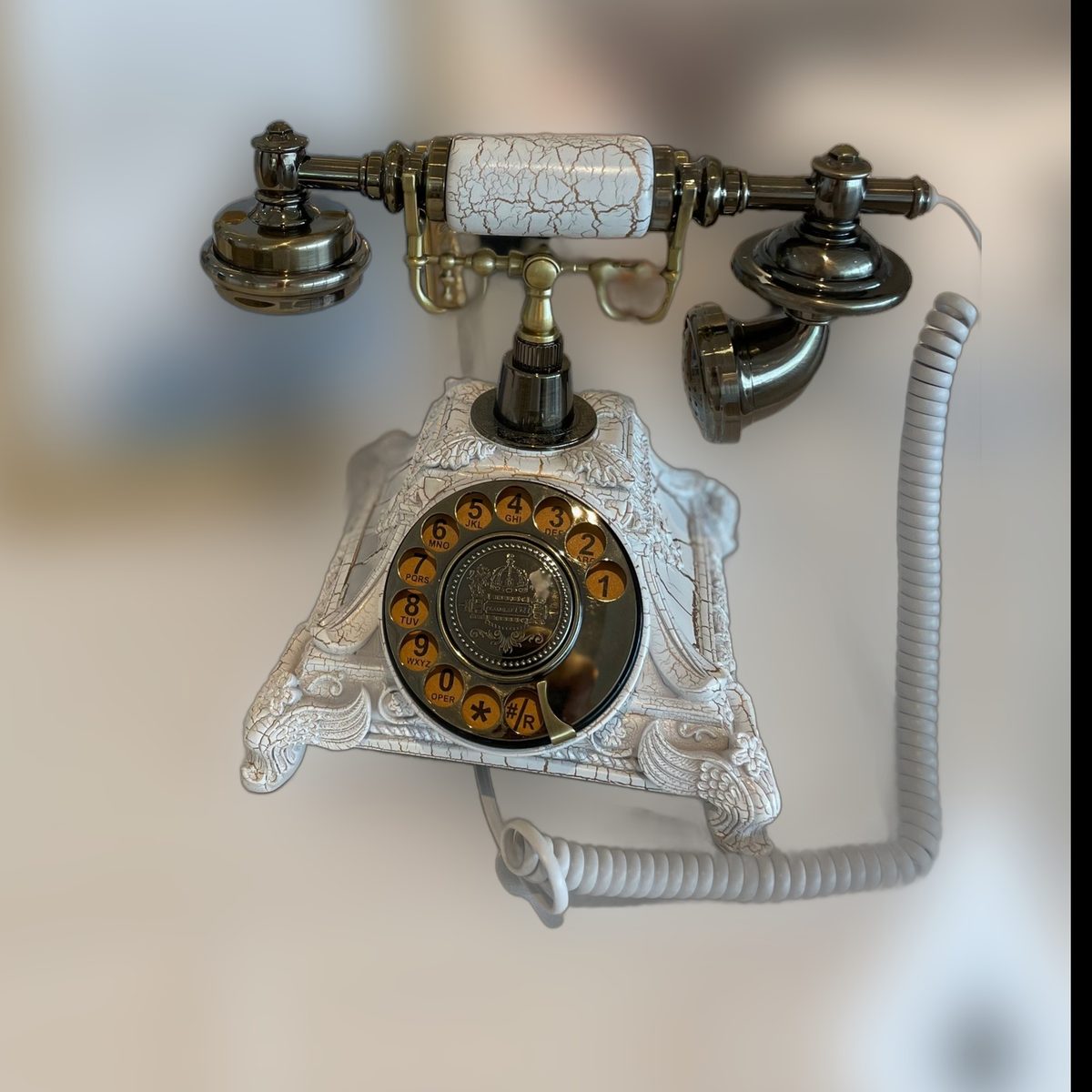 White retro telephone audio guestbook with brass dial